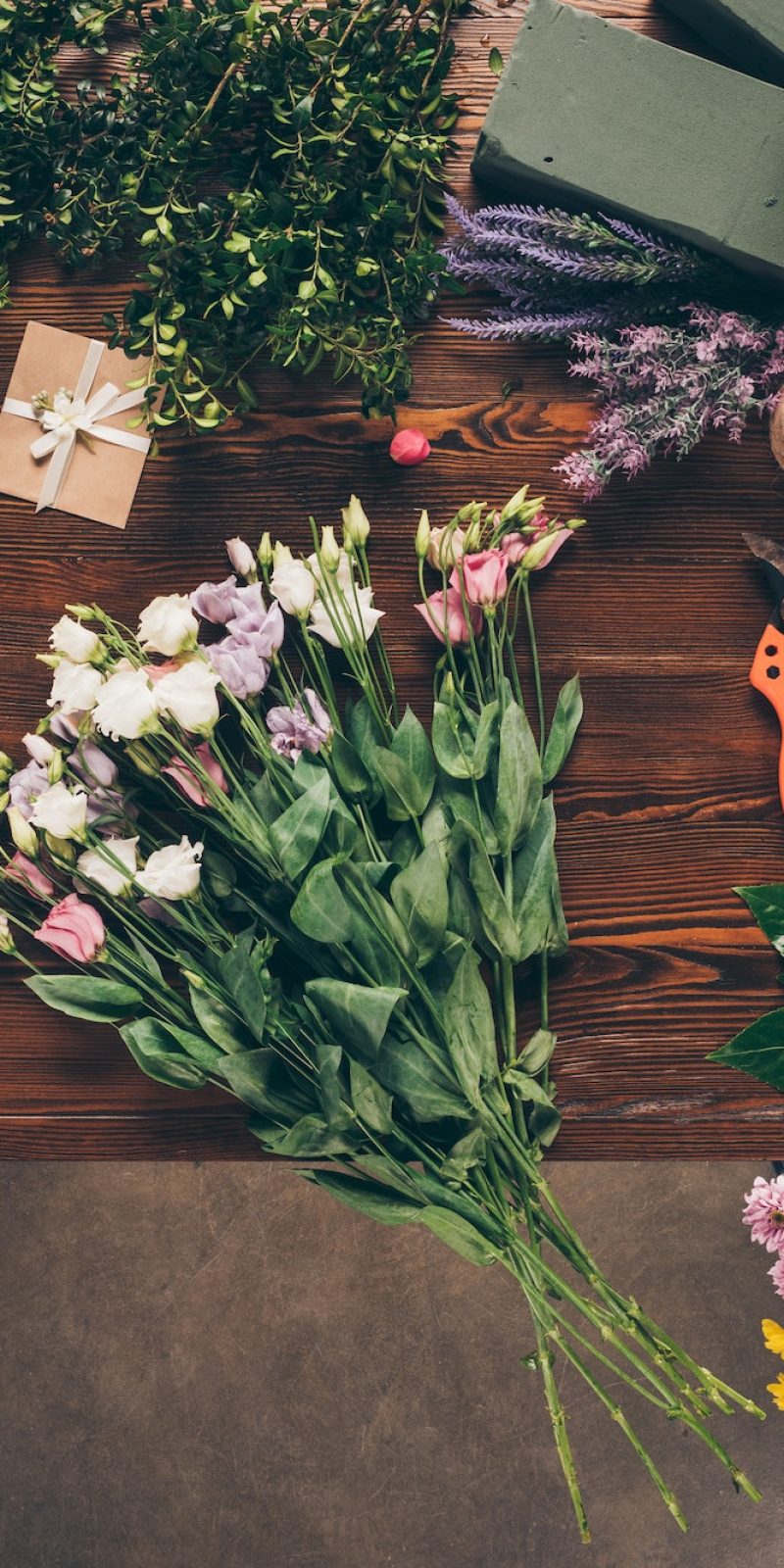 top view of bouquet of roses on florist table